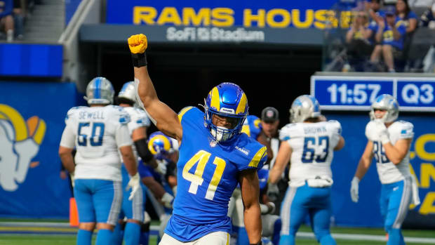 Los Angeles Rams inside linebacker Kenny Young (41) celebrates a third quarter sack of Detroit Lions quarterback Jared Goff (background) in the third quarter at SoFi Stadium.